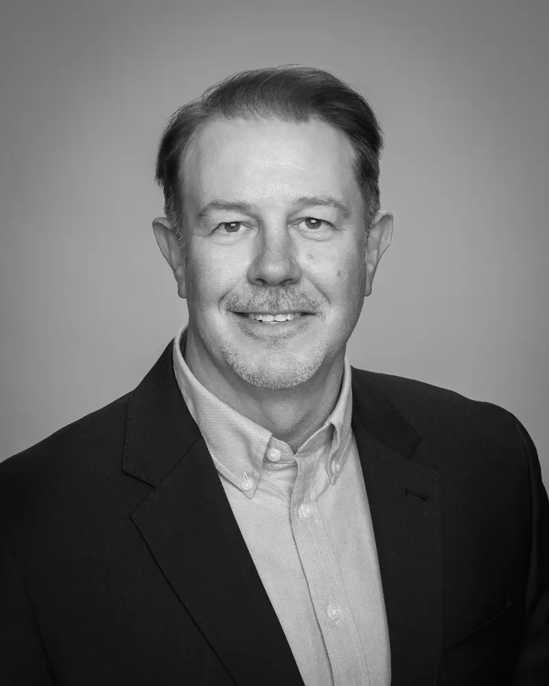 Black and white headshot of Mike Solomon - Zero dB Communications