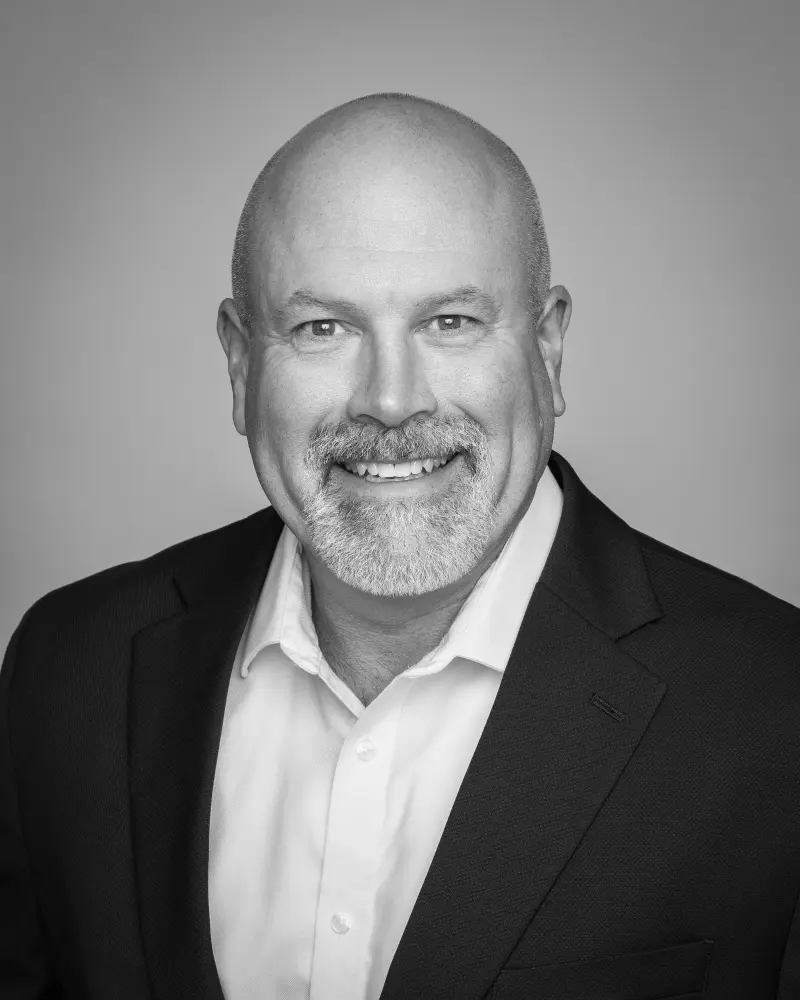 Black and white headshot of Shane Stavros - Zero dB Communications